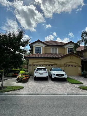 a car parked in front of a house
