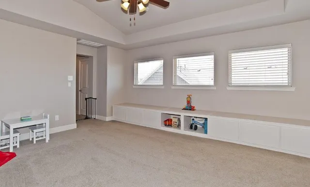 a room with furniture and window