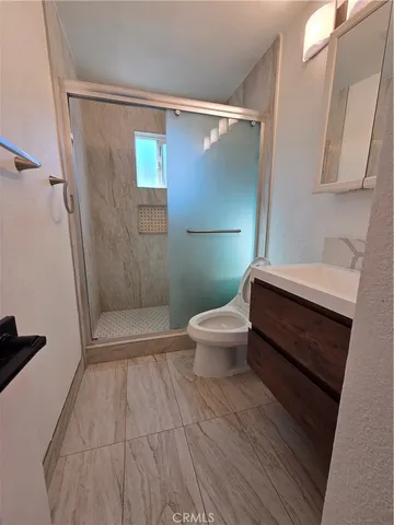 a bathroom with a sink and a toilet