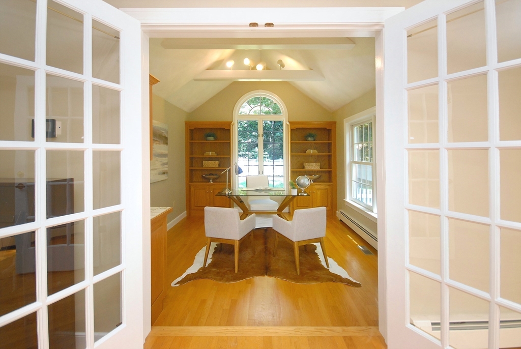 53 Sarah Way Concord, MA 01742 - Photo 6 of 42 a view of a living room with a large window