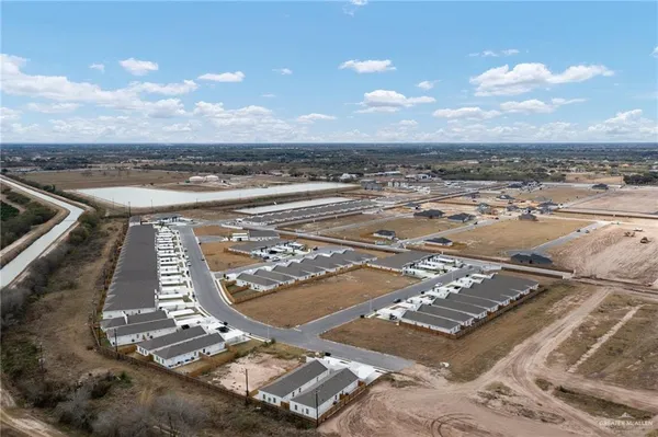 an aerial view of a parking space and city view
