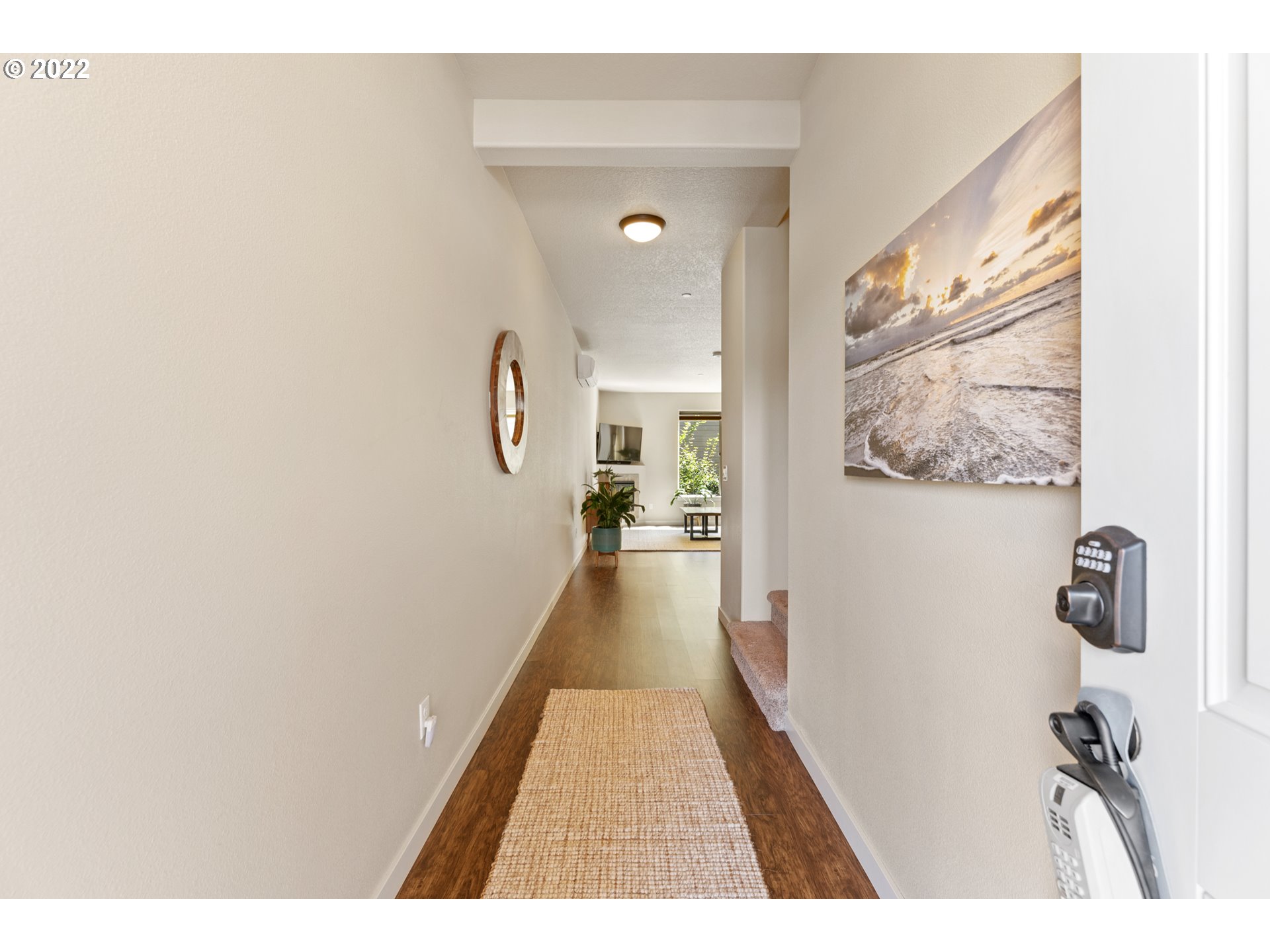 77 North 41st Place Ridgefield, WA 98642 - Photo 3 of 31 a hallway with wooden floor in a bathroom