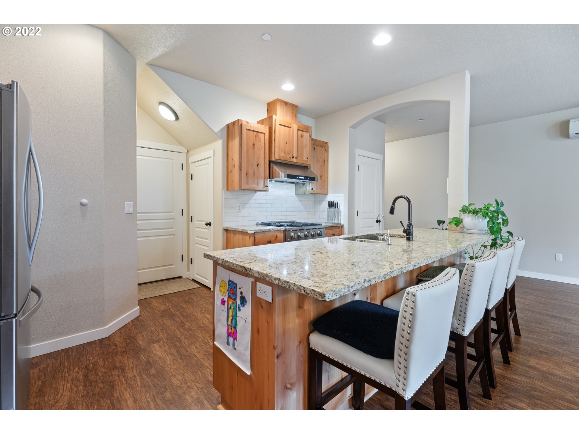 77 North 41st Place Ridgefield, WA 98642 - Photo 9 of 31 a kitchen with a table and chairs