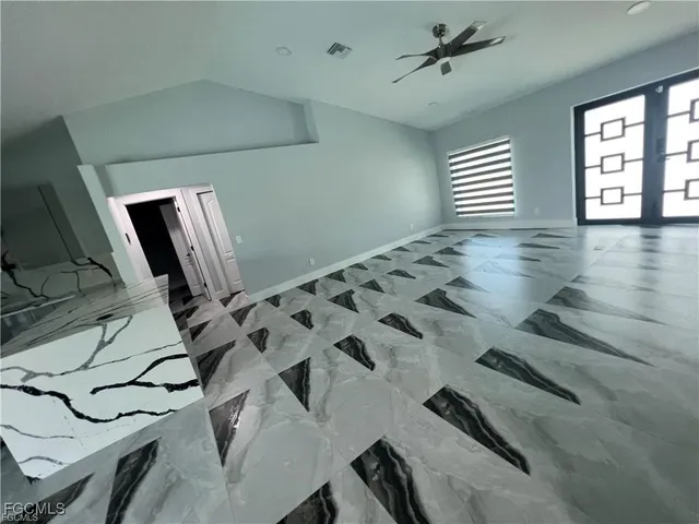 a view of a livingroom with wooden floor