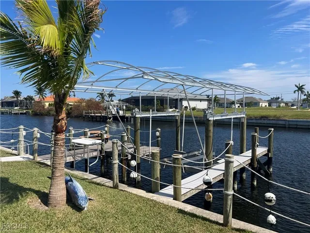 a view of a chairs and table in a patio