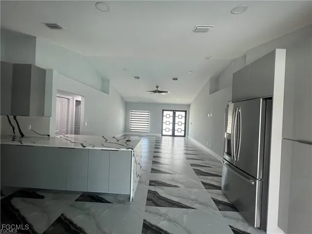 a view of a kitchen with a window