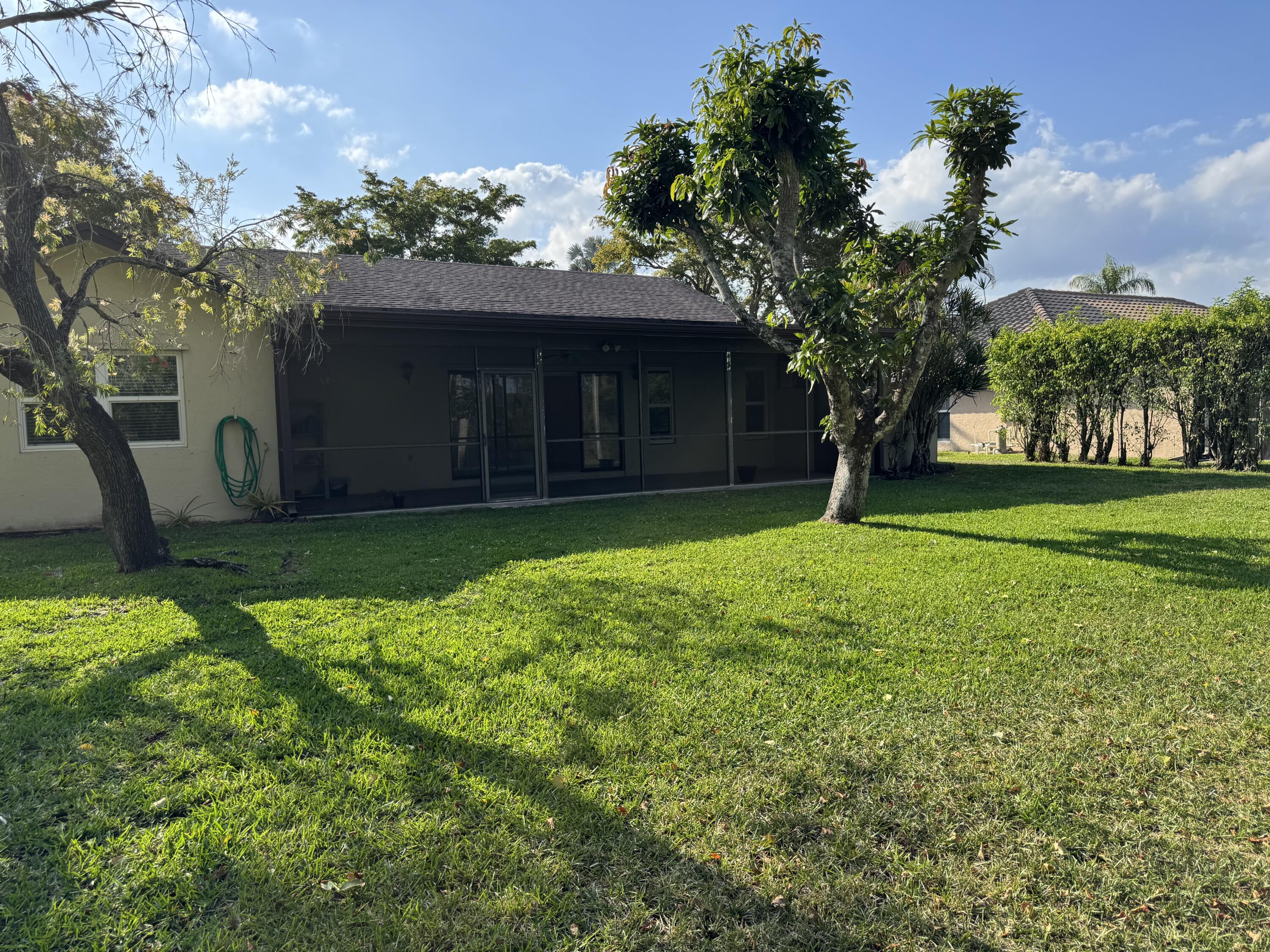 21068 Shady Vista Lane Boca Raton, FL 33428 - Photo 39 of 42 VIEW OF REAR YARD TO SCR. PATIO