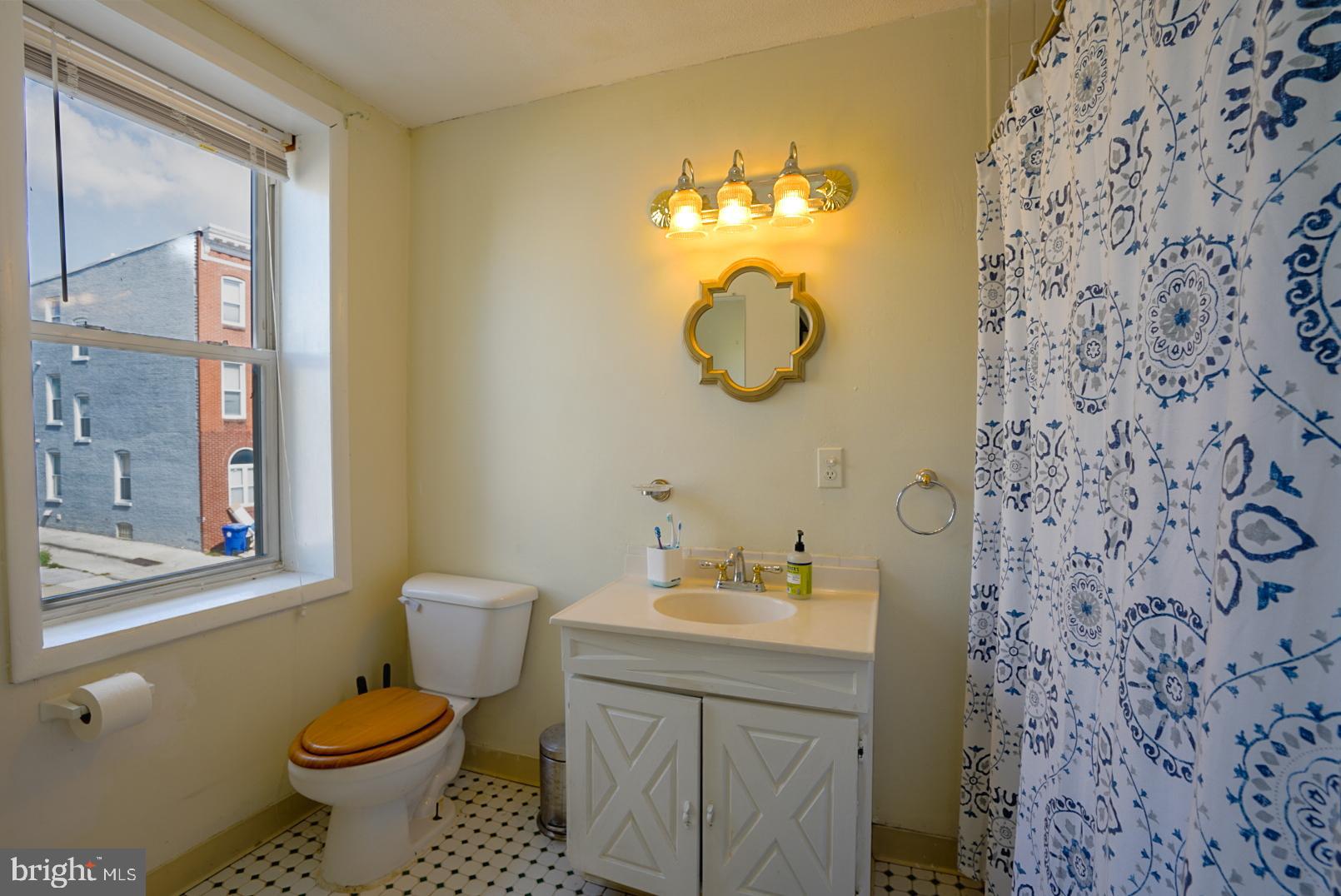 1501 Light Street Baltimore, MD 21230 - Photo 13 of 16 spacious bathroom with tub and shower