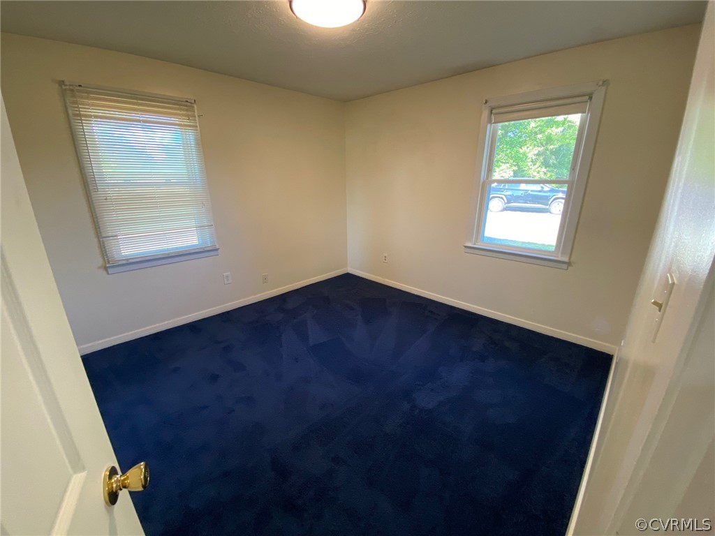 3009 Bibb Store Road Louisa, VA 23093 - Photo 12 of 22 an empty room with windows
