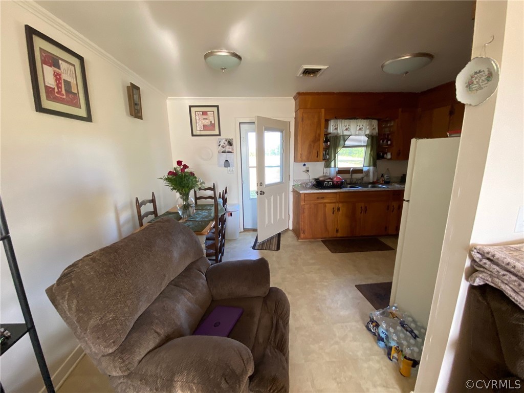 3009 Bibb Store Road Louisa, VA 23093 - Photo 18 of 22 a living room with furniture and a flat screen tv