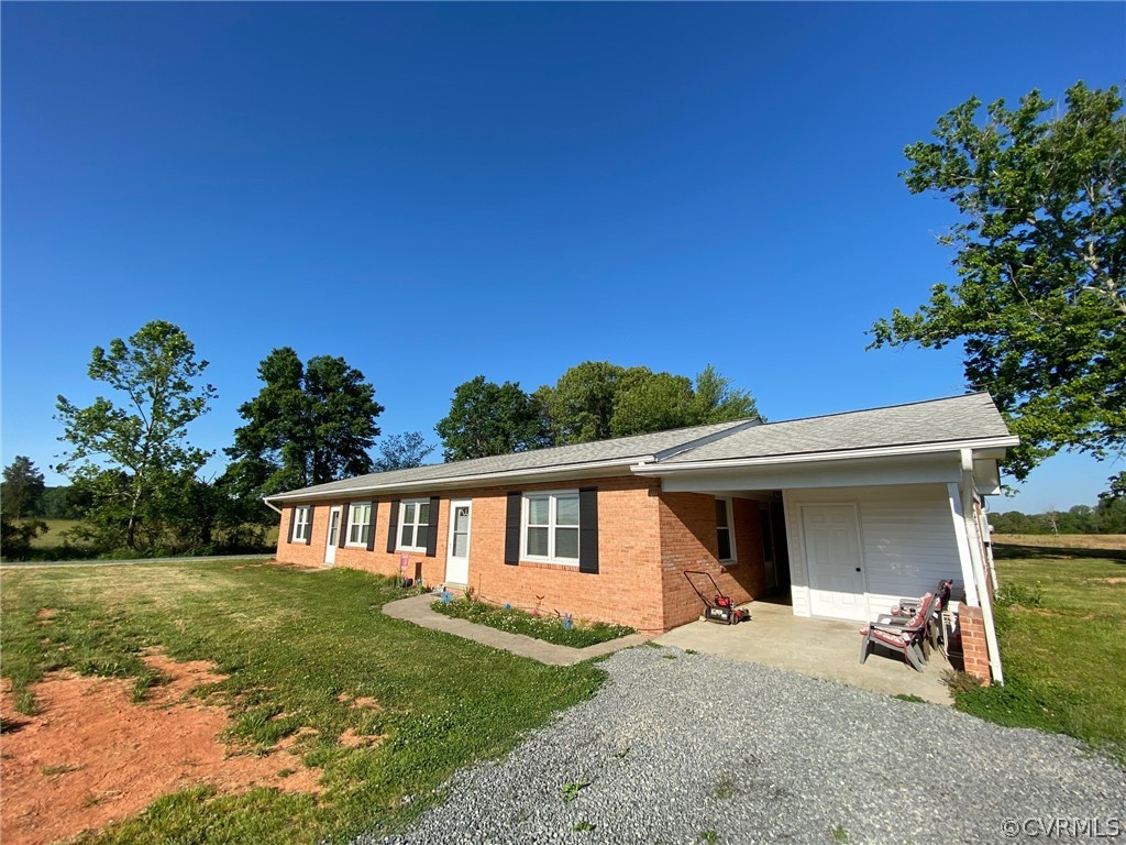 3009 Bibb Store Road Louisa, VA 23093 - Photo 3 of 22 a view of a house with a yard