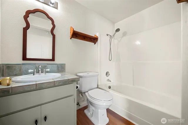 a view of a storage & utility room with washer and dryer