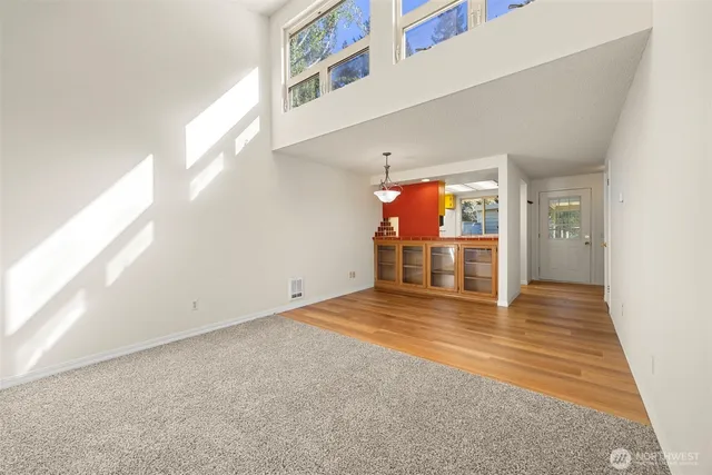 a view of a living room with a window