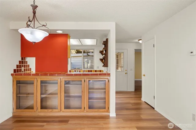 a view of a kitchen from the hallway