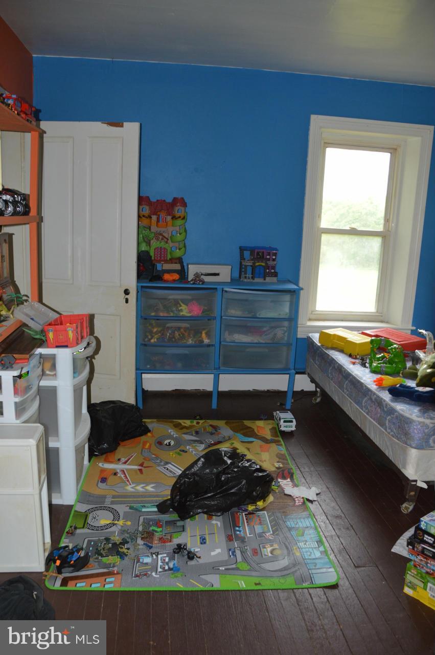 5219 Frock Road Taneytown, MD 21787 - Photo 16 of 17 a room with storage and utility