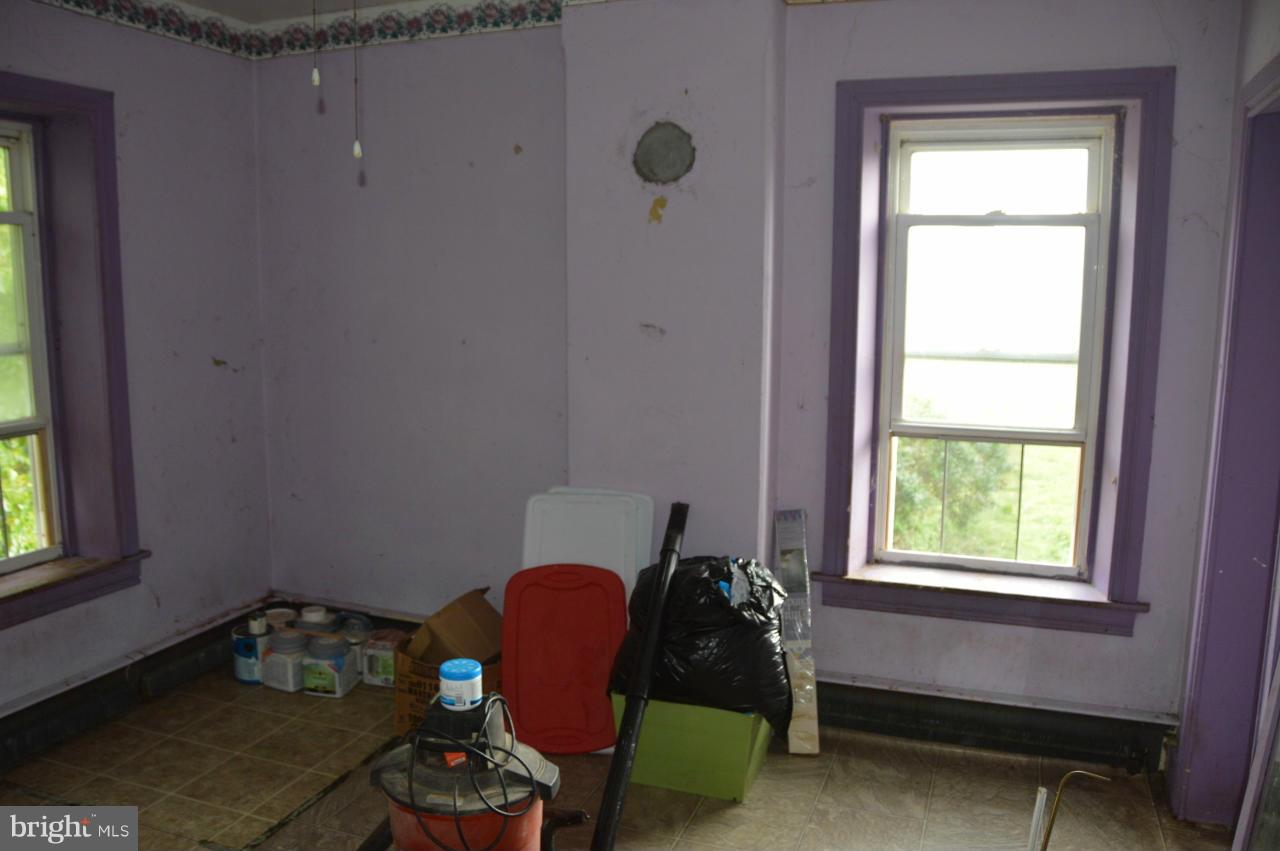 5219 Frock Road Taneytown, MD 21787 - Photo 17 of 17 a room with furniture and a window