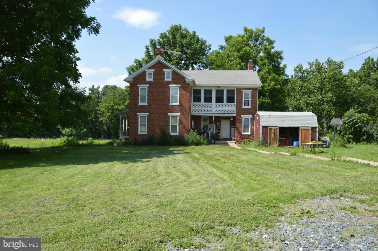 5219 Frock Road Taneytown, MD 21787 - Photo 9 of 17 a view of a house with a yard and sitting area