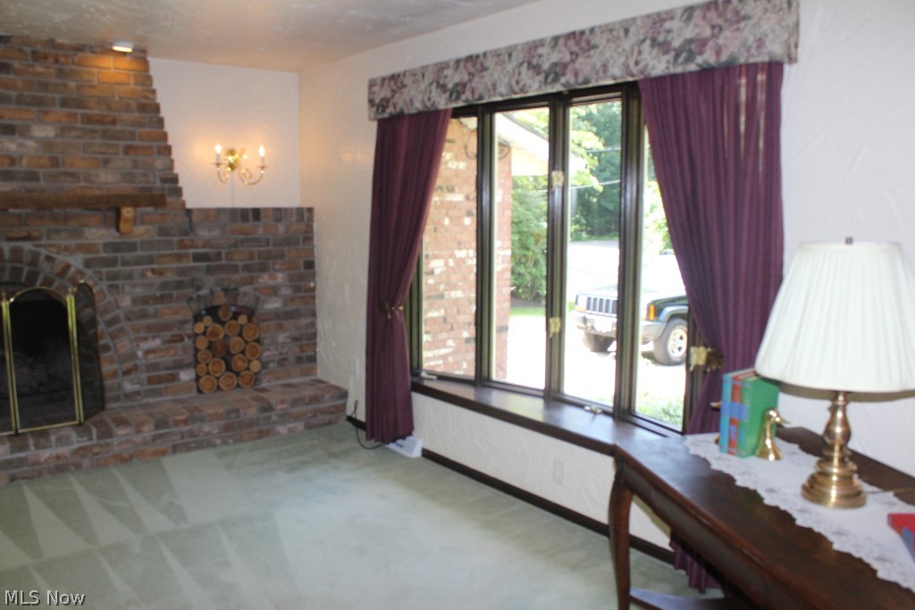 444 Stoner Road Clinton, OH 44216 - Photo 15 of 25 Living room with outstanding designed fireplace*