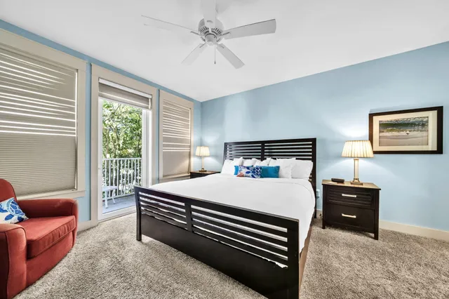 a bedroom with a bed a couch and a couch