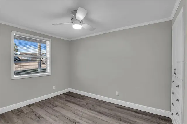 a view of a room with a large window