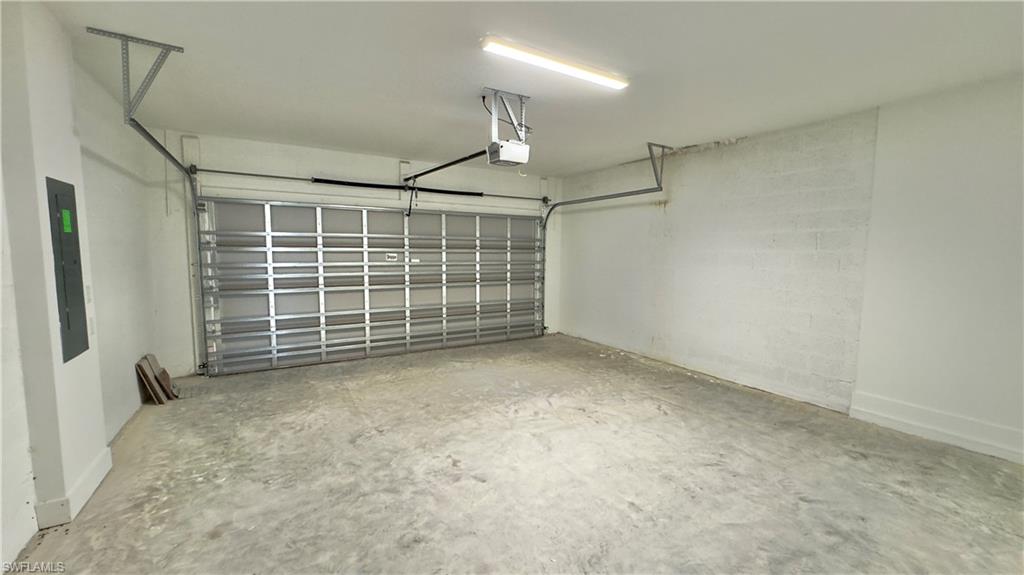 5089 Panella Avenue Ave Maria, FL 34142 - Photo 15 of 46 a view of an empty room with a fireplace