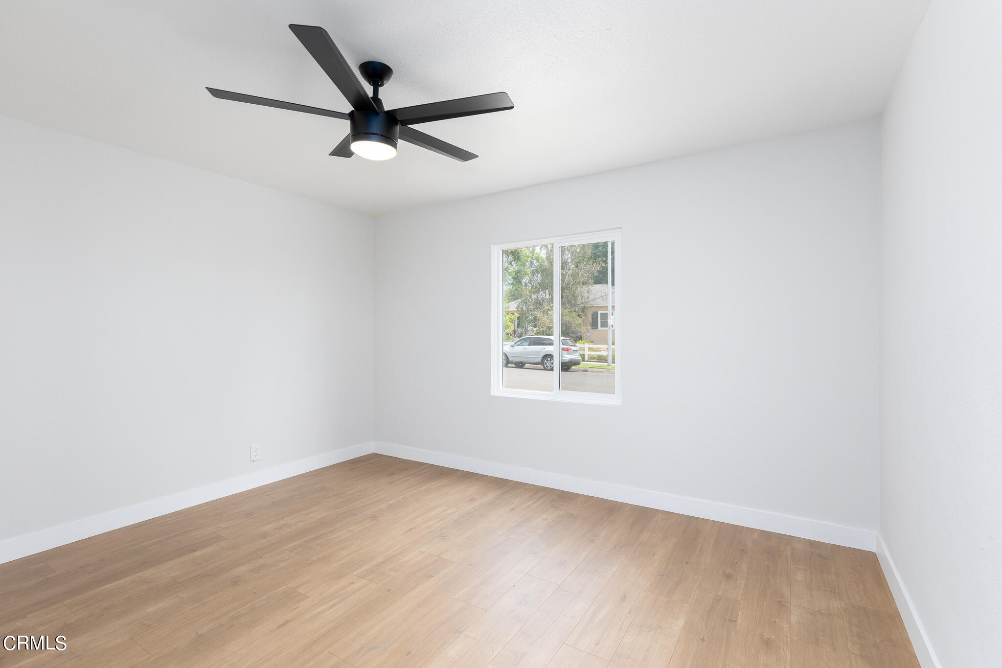 2485 Hanning Avenue Altadena, CA 91001 - Photo 16 of 36 an empty room with a ceiling fan and window