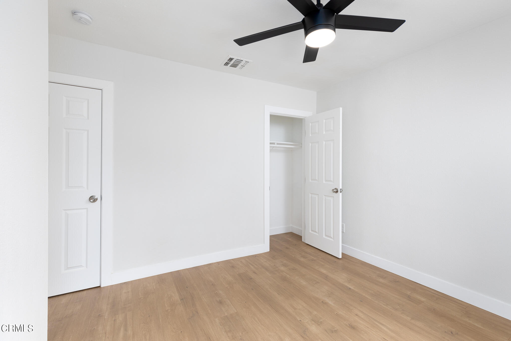 2485 Hanning Avenue Altadena, CA 91001 - Photo 18 of 36 an empty room with a ceiling fan and carpet