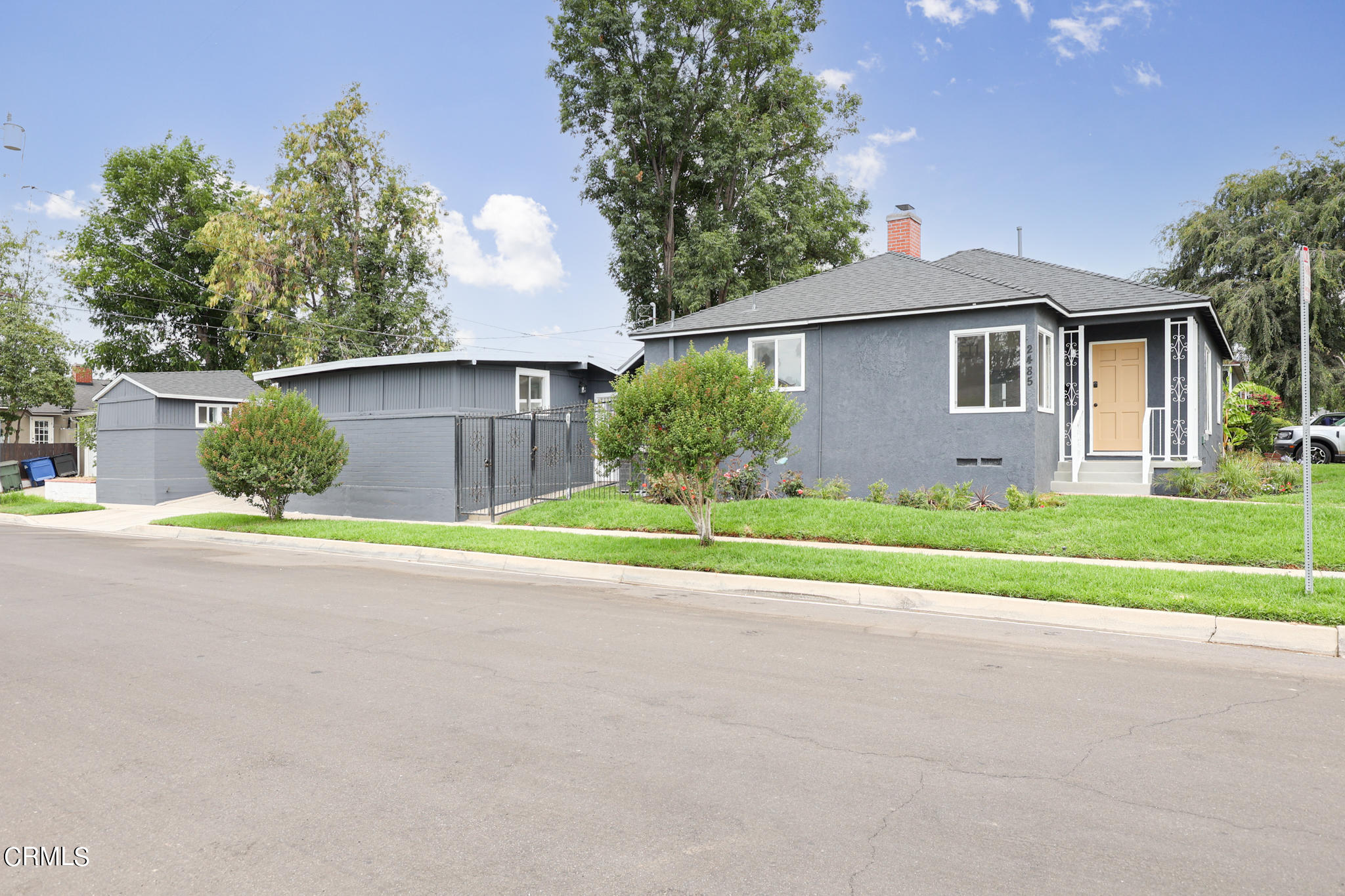2485 Hanning Avenue Altadena, CA 91001 - Photo 3 of 36 a front view of a house with a yard and a garage