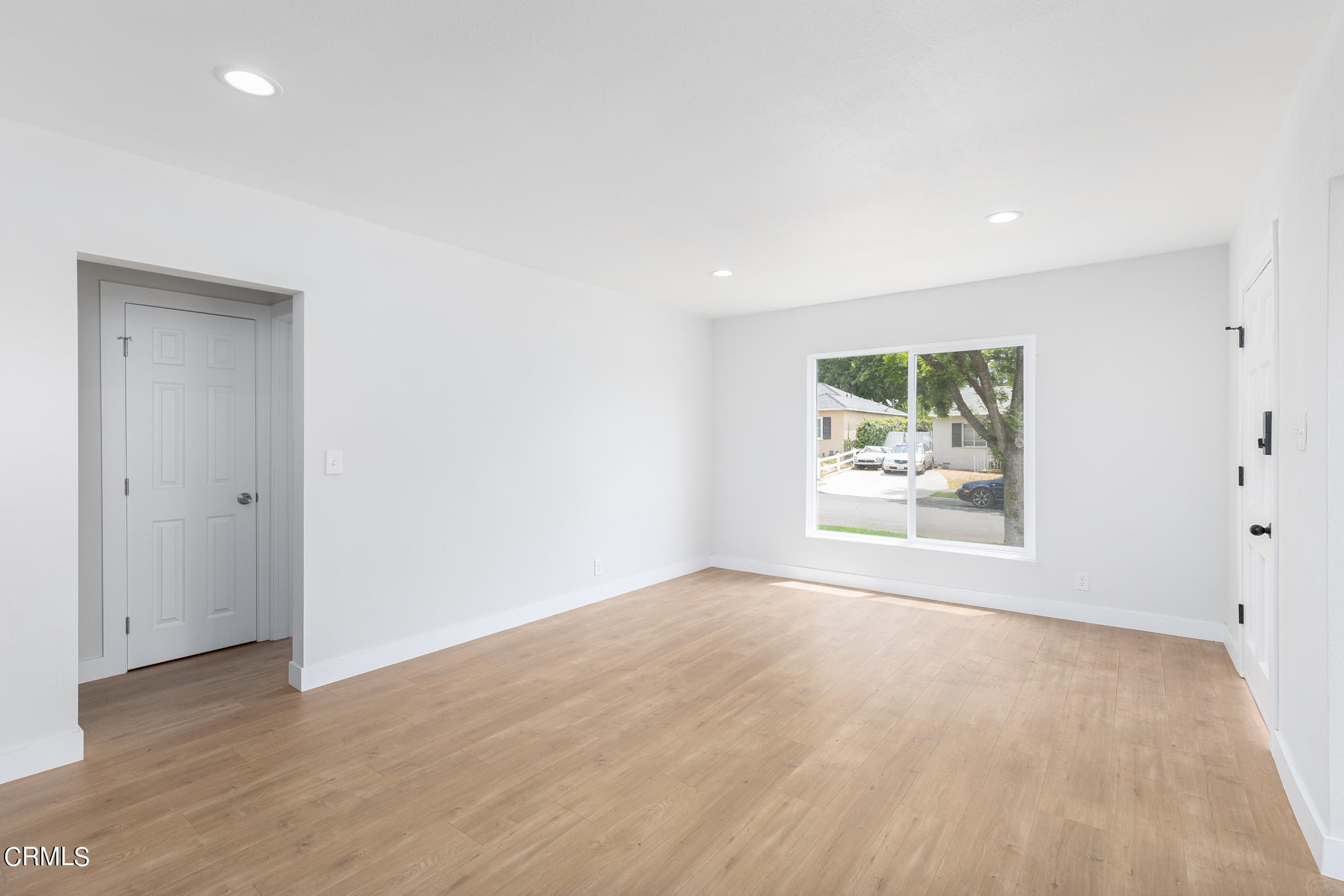 2485 Hanning Avenue Altadena, CA 91001 - Photo 6 of 36 an empty room with window and wooden floor