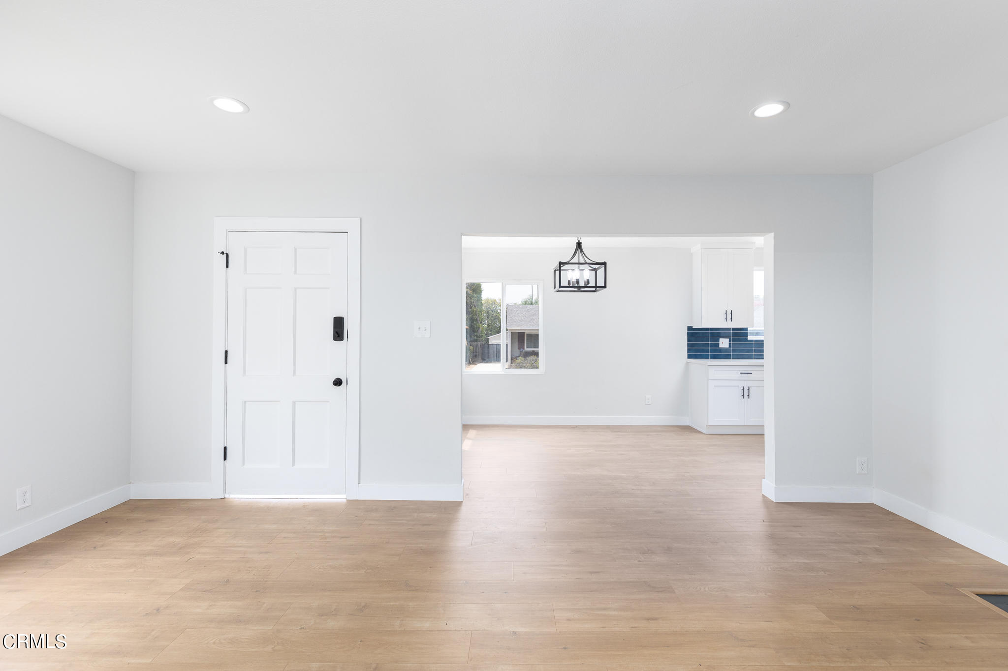2485 Hanning Avenue Altadena, CA 91001 - Photo 9 of 36 a view of a kitchen with a sink and a refrigerator