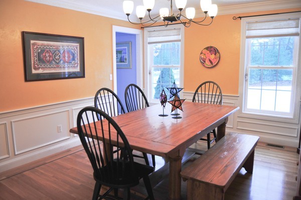 376 Mulpus Road Lunenburg, MA 01462 - Photo 8 of 27 a dining room with furniture a chandelier and wooden floor