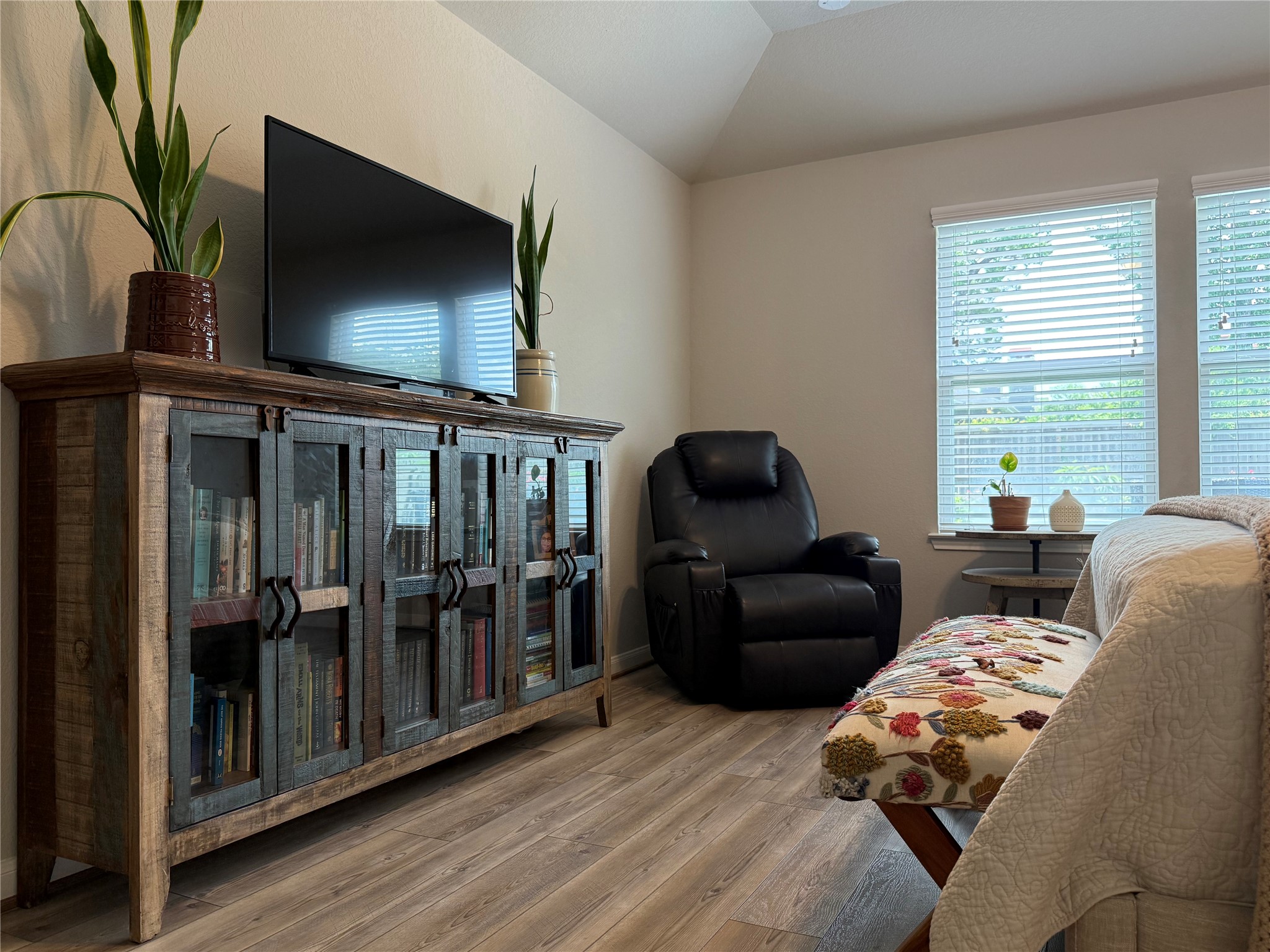 2336 Hagerman Road Conroe, TX 77384 - Photo 20 of 35 a living room with furniture and a flat screen tv