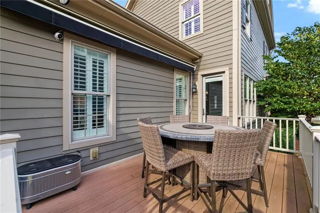 a view of outdoor sitting area with furniture