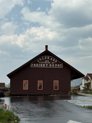 a swimming pool with wooden fence