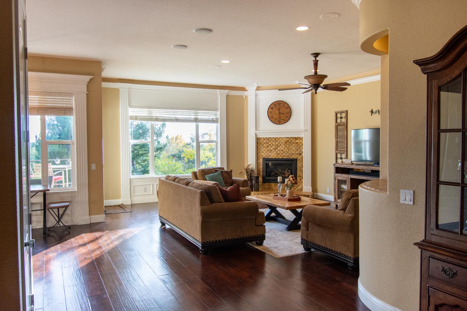 3388 Sudbury Road Cameron Park, CA 95682 - Photo 4 of 55 a living room with furniture fireplace and a large window