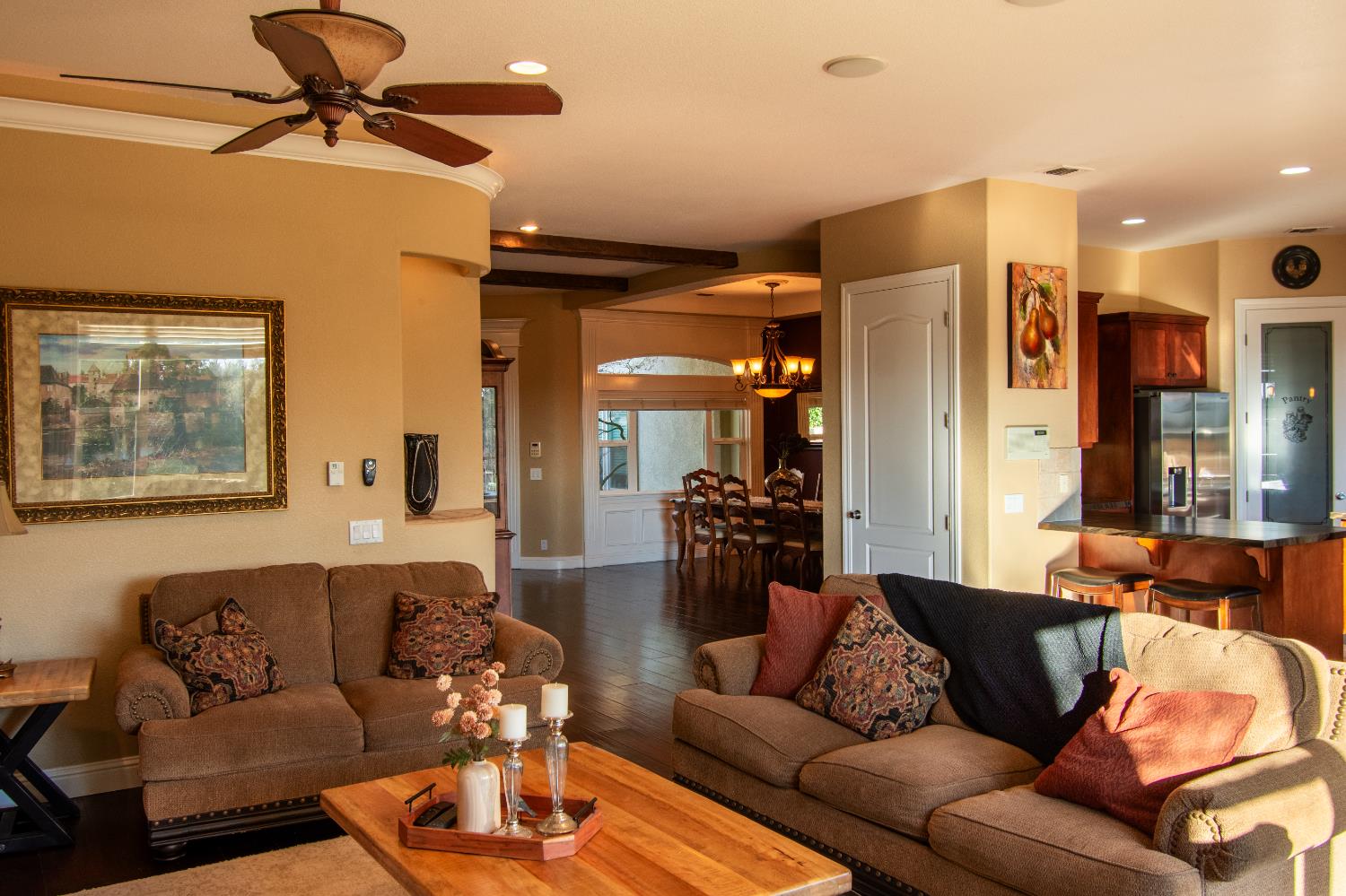 3388 Sudbury Road Cameron Park, CA 95682 - Photo 7 of 55 a living room with furniture and a chandelier