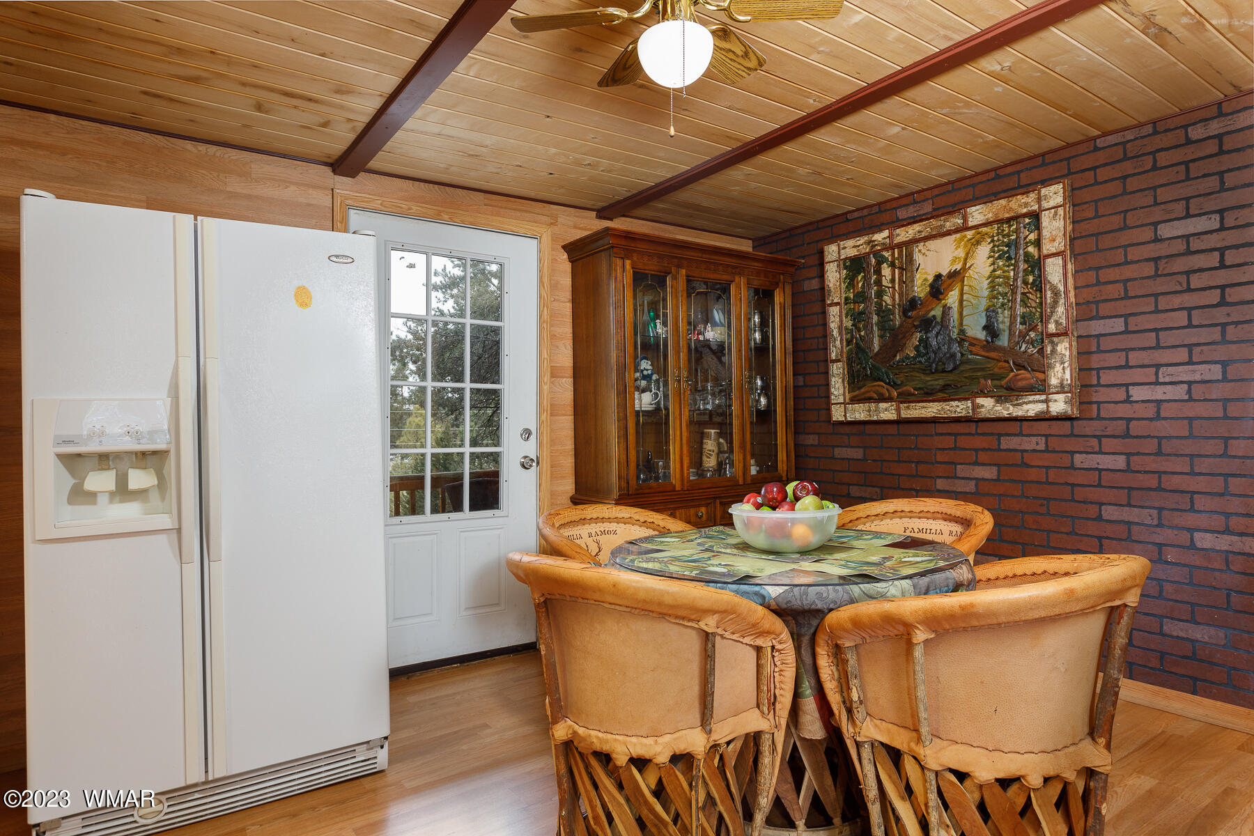 3439 Top View Road Overgaard, AZ 85933 - Photo 11 of 24 a dining room with furniture and window
