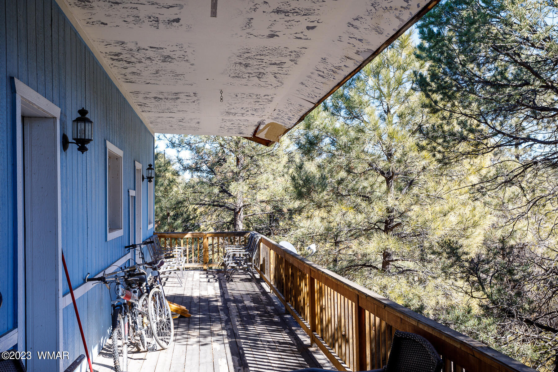 3439 Top View Road Overgaard, AZ 85933 - Photo 19 of 24 a view of balcony with wooden floor and seating space