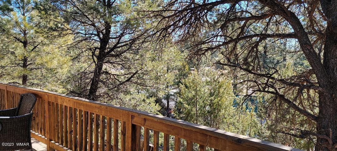 3439 Top View Road Overgaard, AZ 85933 - Photo 5 of 24 a view of a wooden fence and trees