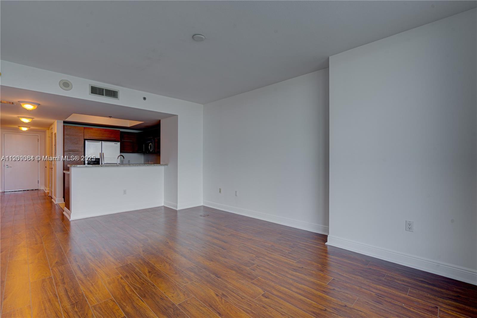 2641 North Flamingo Road, Unit 2307N Sunrise, FL 33323 - Photo 29 of 43 a view of a kitchen with wooden floor