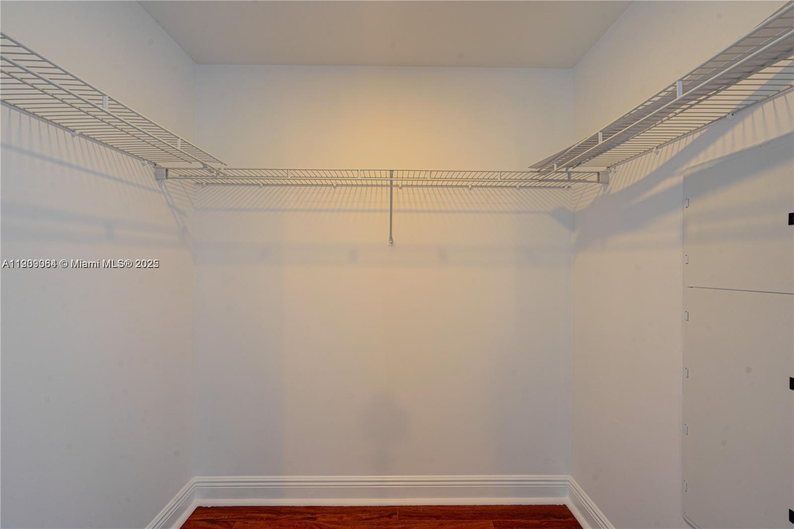 2641 North Flamingo Road, Unit 2307N Sunrise, FL 33323 - Photo 36 of 43 a view of a room with racks on the wall