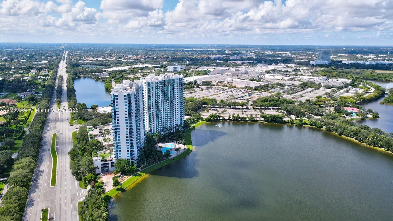2641 North Flamingo Road, Unit 2307N Sunrise, FL 33323 - Photo 6 of 43 a view of a city and lake