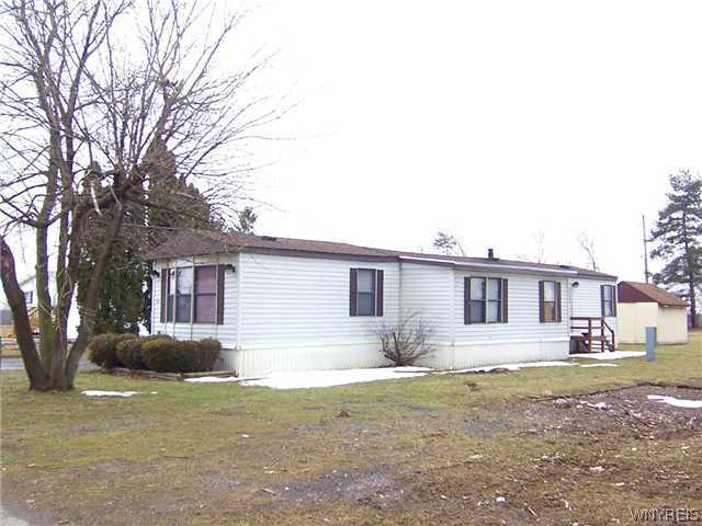 3207 Pratt Road, Unit 48A Batavia, NY 14020 - Photo 1 of 1 Exterior Front. WELL KEPT 3 BEDRM. MOBILE HOME!