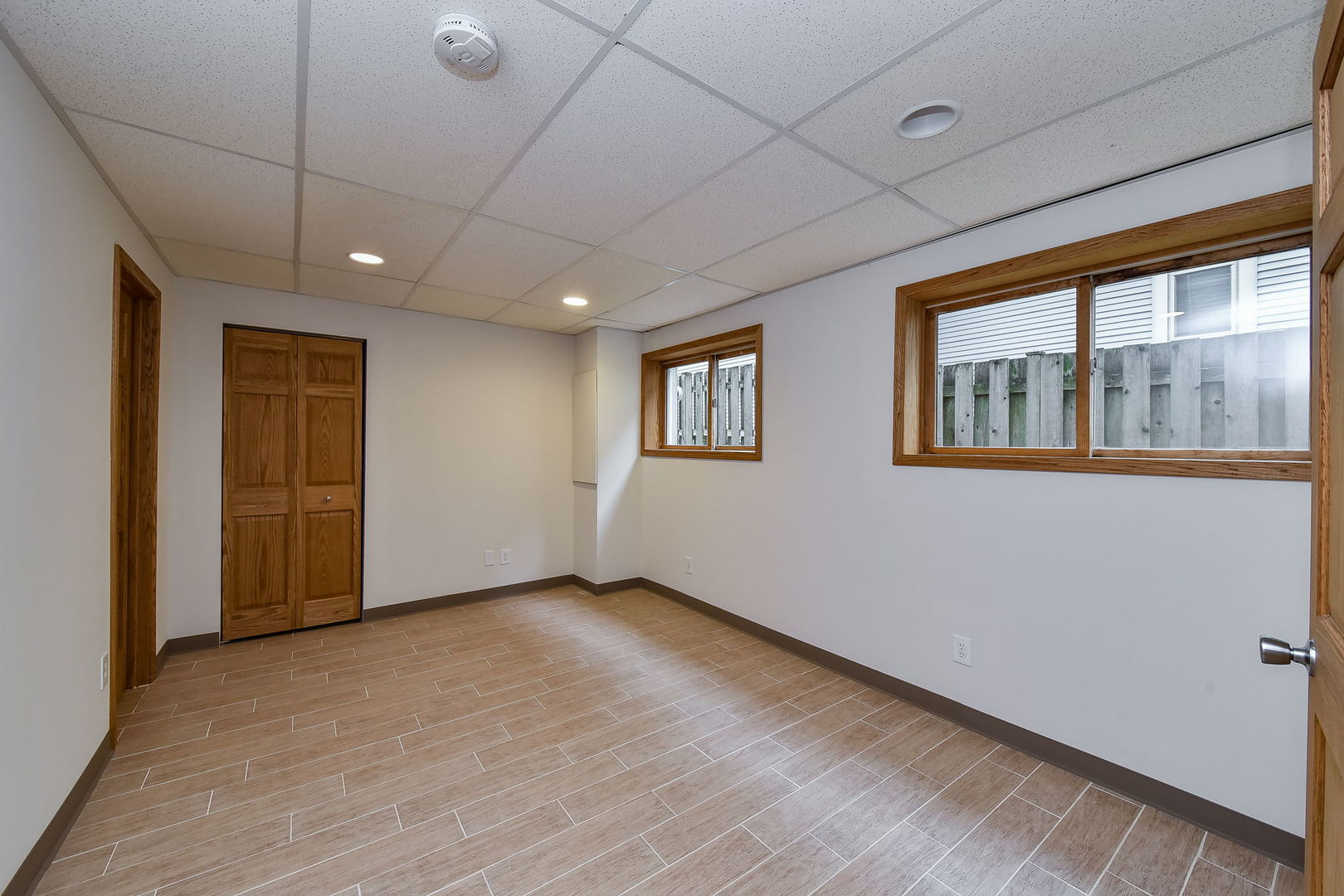 320 North Wright Street Naperville, IL 60540 - Photo 13 of 27 a view of an empty room with a window