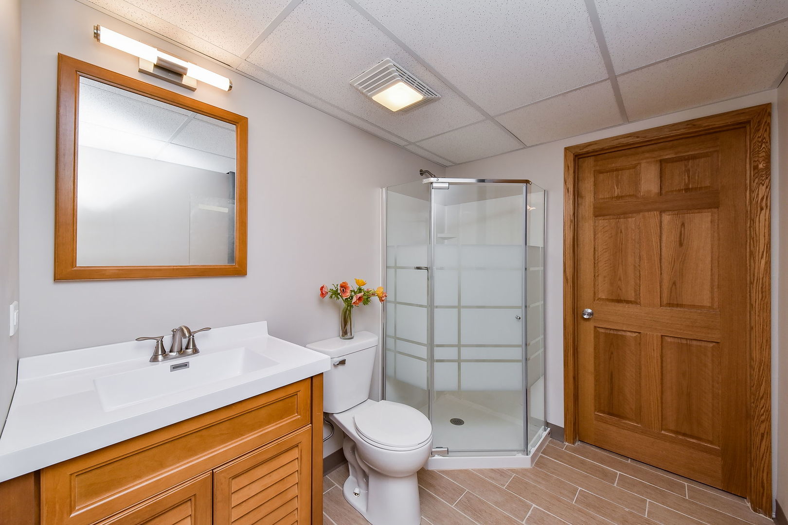 320 North Wright Street Naperville, IL 60540 - Photo 14 of 27 a bathroom with a sink toilet and shower