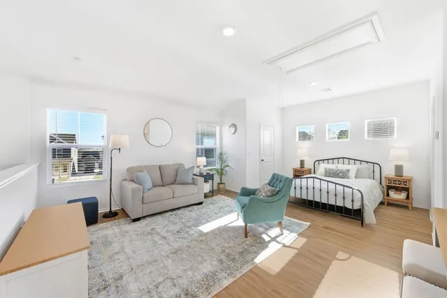 a living room with furniture and a couch