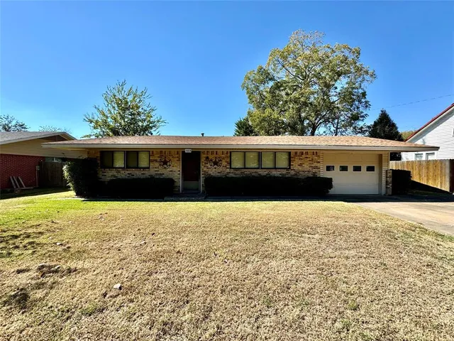 a view of house with outdoor space