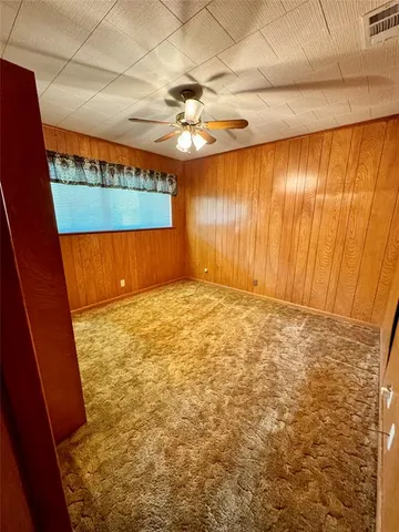 en empty room with a window