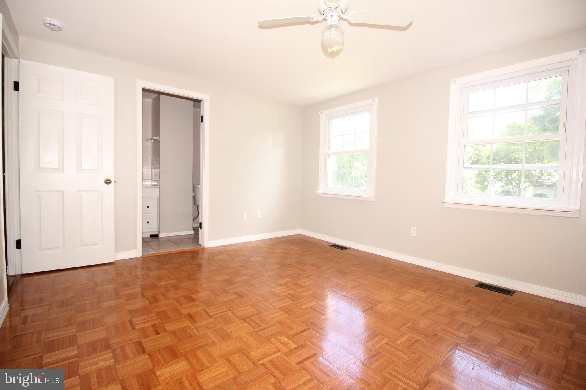 2 Twig Lane Willingboro, NJ 08046 - Photo 15 of 32 an empty room with windows and fan