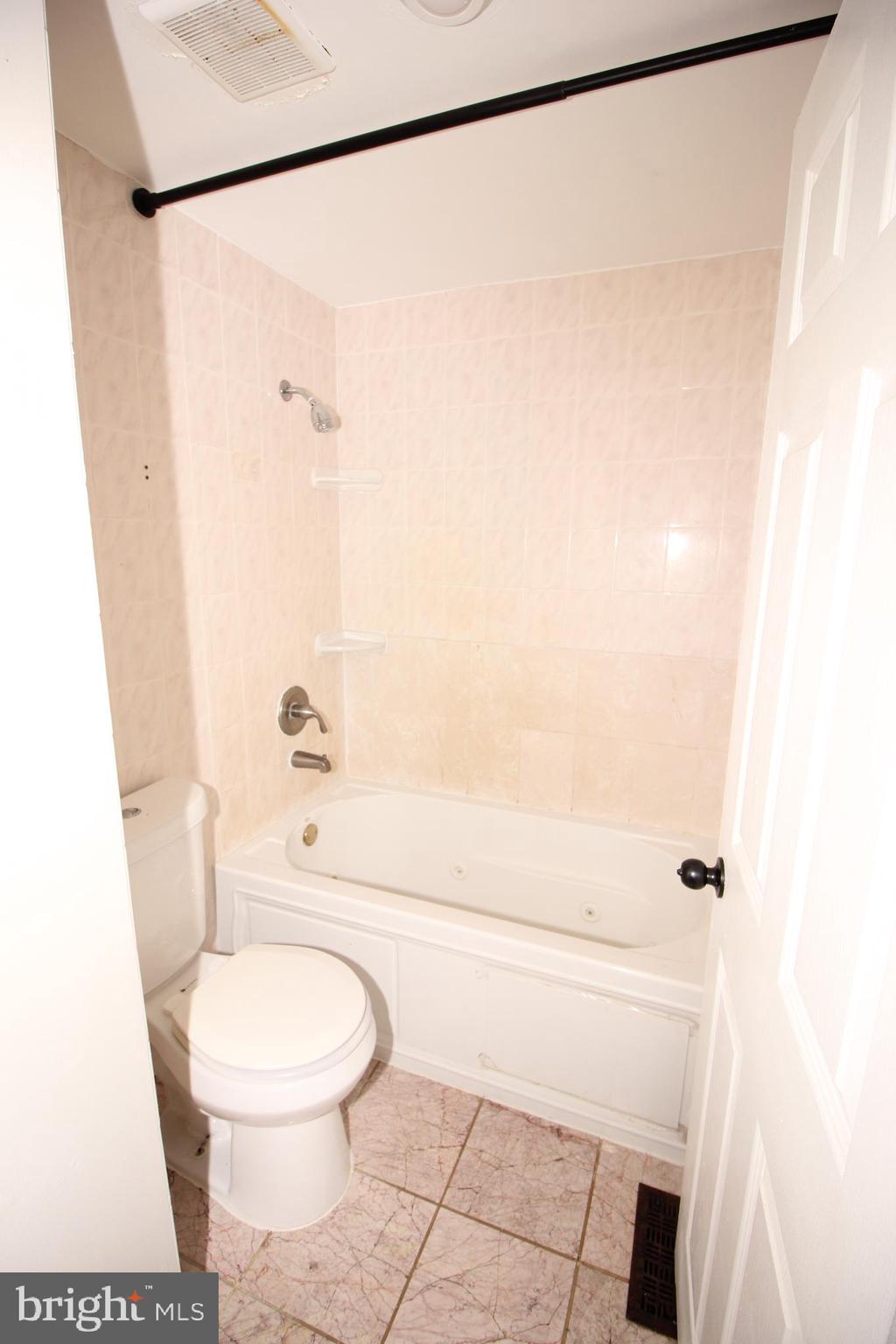 2 Twig Lane Willingboro, NJ 08046 - Photo 19 of 32 a bathroom with a toilet and a shower